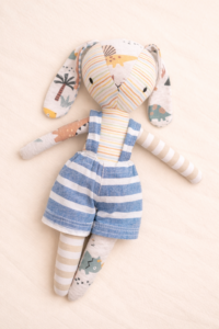 Handmade fabric bunny with overalls